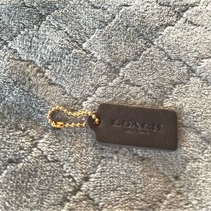 Coach Black Tag with Gold Chain
